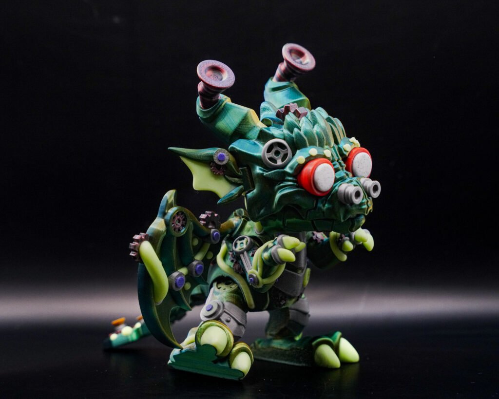 3D printed articulated dragon-robot monster figure, three-quarter view